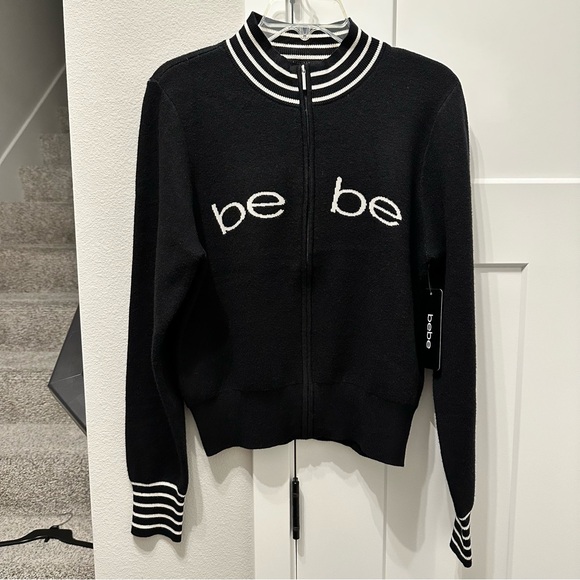 bebe Sweaters - NWT bebe Black Zip-Front Logo Cardigan with Striped Trim size M